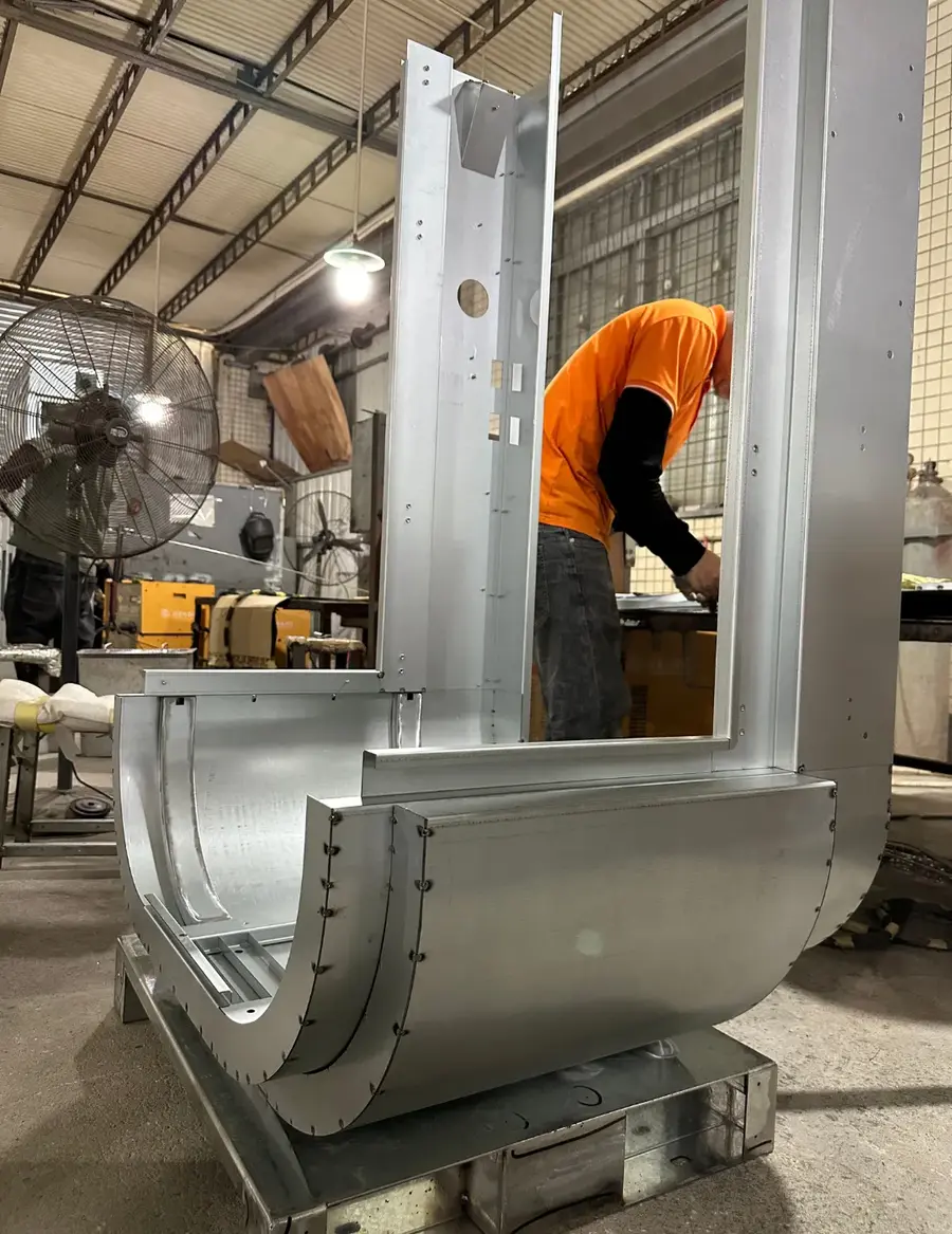 men working in ev charge assembly
