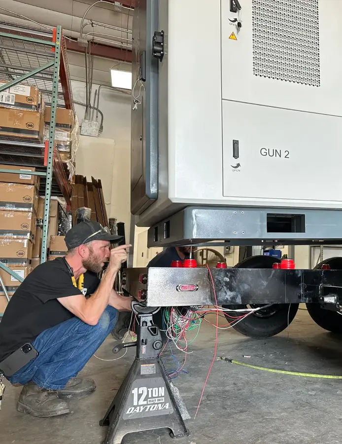 man working on flexx charger